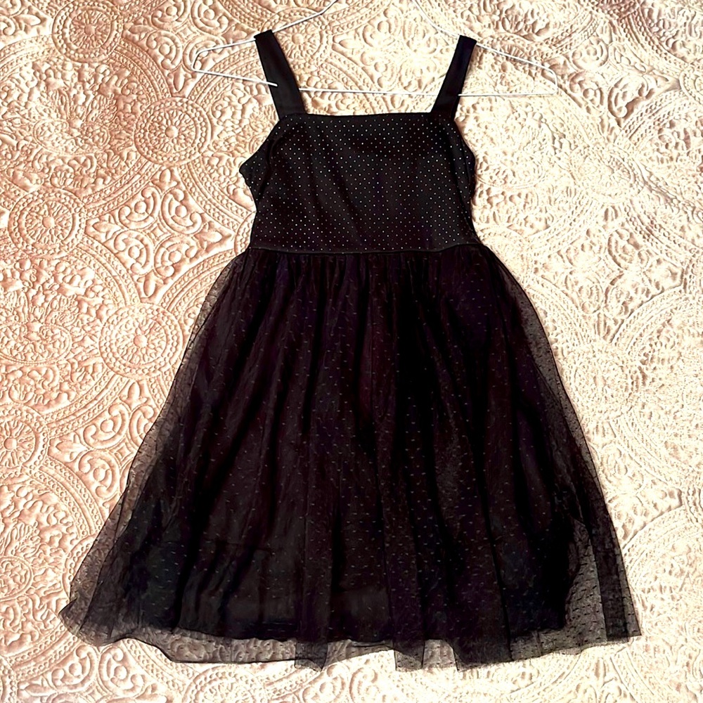 black sleeveless dress with gold sequin detail
